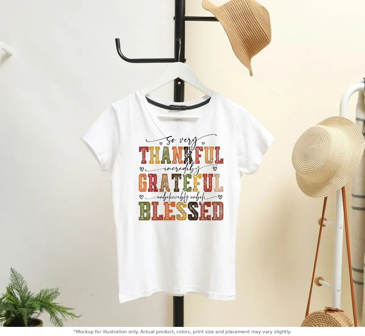 White tee mockup, on a hanger in a styled room